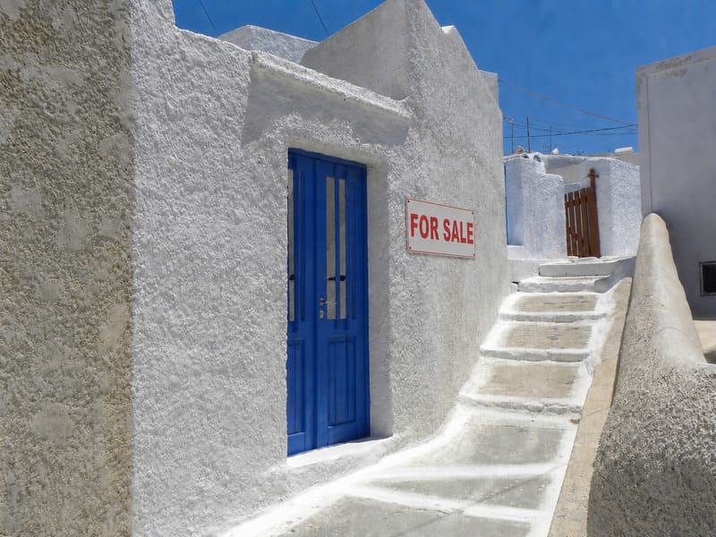International property investor evaluating a real estate opportunity in Greece